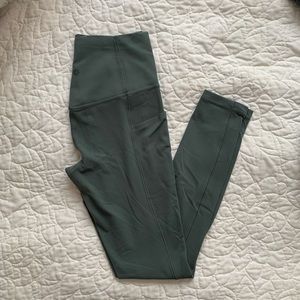 Athleta salutation stash pocket II